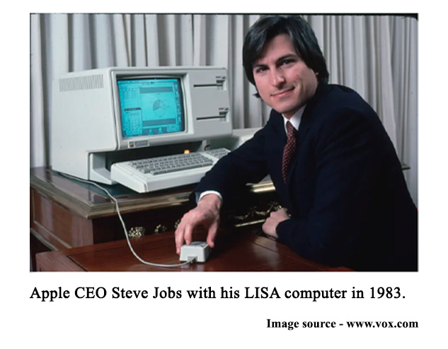 Apple CEO Steve Jobs with his LISA computer in 1983